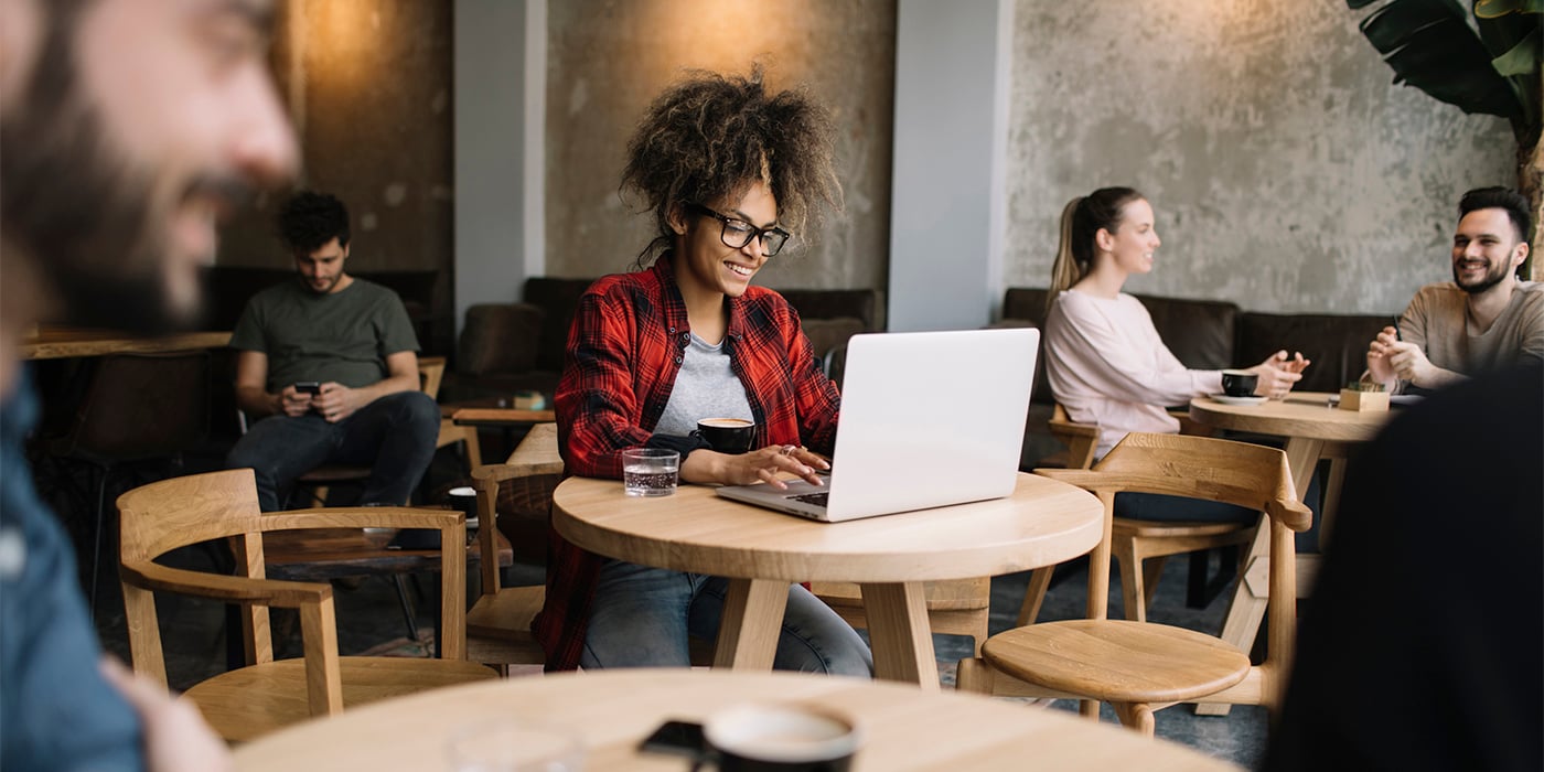 Woman using AI on laptop
